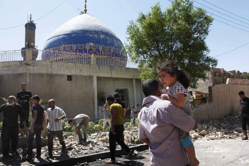  blasts hit a Shia mosque in Baghdad
