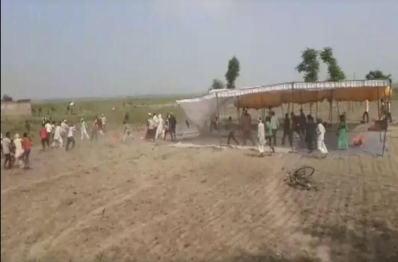 Man shot dead in front of police, officials in up