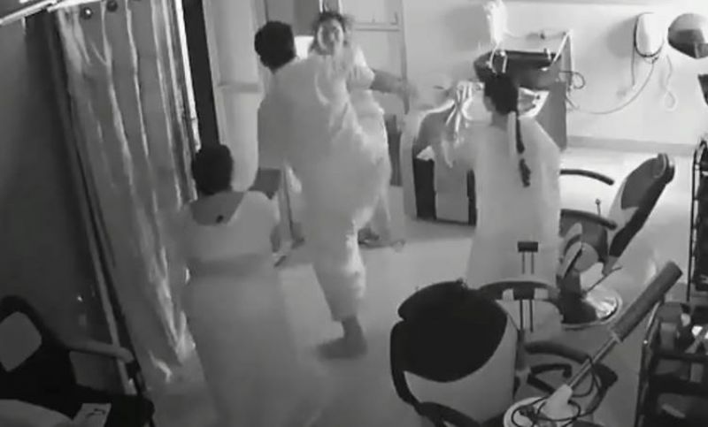 Ex-DMK corporator kicks woman