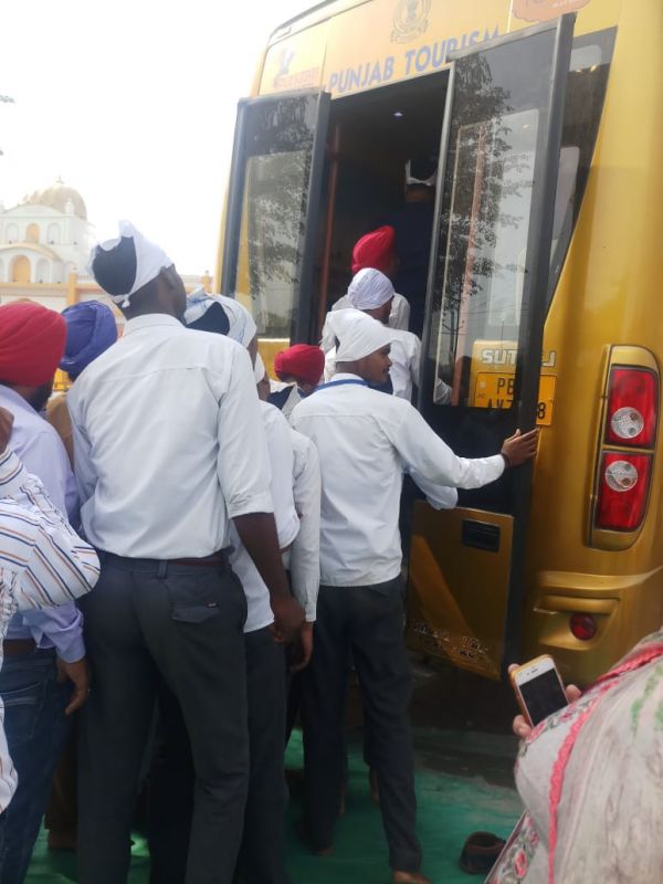 Special exhibition bus of tourism department educating pilgrims through photo, videos